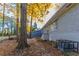 Side view of house showcasing gray siding and landscaping at 2363 Dabney Ter, Atlanta, GA 30344
