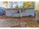 Ranch style home with gray siding, steps, and back patio at 2363 Dabney Ter, Atlanta, GA 30344