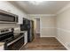 Modern kitchen with stainless steel appliances and granite countertops at 2363 Dabney Ter, Atlanta, GA 30344