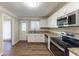 Updated kitchen featuring granite countertops and stainless steel appliances at 2363 Dabney Ter, Atlanta, GA 30344