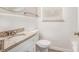 Clean bathroom with white tile, granite countertop, and updated vanity at 2415 Plantation Dr, Atlanta, GA 30344