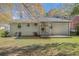 Ranch house with backyard, steps and patio at 2415 Plantation Dr, Atlanta, GA 30344