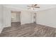 Bright and airy living room with wood-look floors and ceiling fan at 2415 Plantation Dr, Atlanta, GA 30344