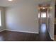 Hardwood floors and neutral-colored walls at 6325 Westbury Rd, Riverdale, GA 30274