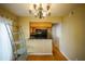 Dining area with hardwood floors and kitchen access at 6940 Roswell Rd # C14, Atlanta, GA 30328
