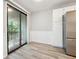 Kitchen dining area with sliding glass doors to balcony at 8740 Roswell Rd # 9G, Sandy Springs, GA 30350