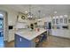 Modern kitchen with white cabinets, granite counters, and stainless steel appliances at 5035 Shade Creek Xing, Cumming, GA 30028