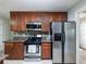 Well-equipped kitchen with stainless steel appliances and granite counters at 522 Red Tip Ln, Loganville, GA 30052