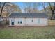 House exterior view, fenced backyard, and grassy area at 9132 Thrash Sw St, Covington, GA 30014