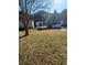 Large backyard with a shed and parking area at 230 Highland Blvd, Stockbridge, GA 30281