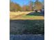 Spacious backyard with mature trees and open space at 230 Highland Blvd, Stockbridge, GA 30281