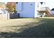 Spacious backyard with grassy area and wooden fence at 6298 Hampstead Ln, Douglasville, GA 30134