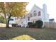 Two-story house with gray siding, white stairs, and landscaping at 6298 Hampstead Ln, Douglasville, GA 30134