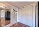 Walk-in pantry with built-in shelving and hardwood floors at 911 S Lassetter Cir, Villa Rica, GA 30180