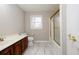 Bathroom with double vanity, shower/tub combo, and tiled floors at 1841 Kanawha Trl, Smoke Rise, GA 30087