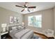 Spacious bedroom with hardwood floors and large window at 1991 Wells Sw Dr, Atlanta, GA 30311