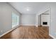 Bright dining room with hardwood floors and fireplace at 1238 Sandy Creek Rd, Fayetteville, GA 30214