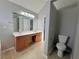 Main bathroom with double vanity and toilet at 2897 Hutchins Walk Ct, Snellville, GA 30078