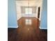 Formal dining room with hardwood floors and elegant chandelier at 2897 Hutchins Walk Ct, Snellville, GA 30078