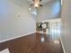 Spacious living room with hardwood floors, high ceilings, and ceiling fan at 2897 Hutchins Walk Ct, Snellville, GA 30078