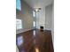 Spacious living room with hardwood floors, fireplace and high ceilings at 2897 Hutchins Walk Ct, Snellville, GA 30078