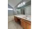 Main bathroom with double vanity, garden tub and updated fixtures at 2897 Hutchins Walk Ct, Snellville, GA 30078