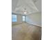 Spacious main bedroom with carpet, ceiling fan and large windows at 2897 Hutchins Walk Ct, Snellville, GA 30078
