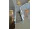 Two-story foyer with a grand staircase and tile flooring at 2897 Hutchins Walk Ct, Snellville, GA 30078