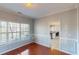 Dining room with hardwood floors and view into kitchen at 117 Ridge Xing, Temple, GA 30179