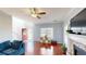 Living room with hardwood floors, fireplace, and entryway at 117 Ridge Xing, Temple, GA 30179