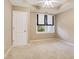 Spacious bedroom with carpeted floors and a closet at 138 Mclaren Gates Dr, Marietta, GA 30060