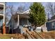 Gray bungalow with front porch and steps leading to entrance at 140 South Se Ave, Atlanta, GA 30315