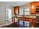 Modern kitchen with granite countertops, stainless steel appliances, and wood cabinets at 647 Longwood Nw Dr, Atlanta, GA 30305