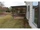 Covered back patio with concrete surface, perfect for outdoor relaxation at 1010 Coleman Place Dr, Roswell, GA 30075