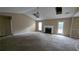 Bright living room with vaulted ceiling and fireplace at 405 Northwind Pl, Stockbridge, GA 30281