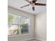 Bright bedroom with ceiling fan and large window at 2140 Wildcat Cliffs Way, Lawrenceville, GA 30043