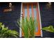 Stylish orange front door with modern landscaping at 851 Flagler Cir, Smyrna, GA 30080