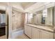 Bathroom with granite countertop, shower, and tub at 4322 Sentinel Nw Vw, Atlanta, GA 30327