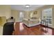 Bright bedroom with hardwood floors and neutral decor at 6851 Roswell Rd # Q20, Atlanta, GA 30328