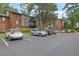 Parking lot with multiple cars parked at 6851 Roswell Rd # Q20, Atlanta, GA 30328