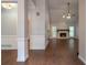 Spacious living room featuring hardwood floors and a stone fireplace at 123 Wildwood Dr, Temple, GA 30179