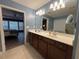 Double vanity bathroom with a view of the bedroom at 325 Ridgewood Trl, Canton, GA 30115