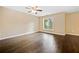 Bright bedroom with hardwood floors and ceiling fan at 3810 Stonewall Se Ter, Atlanta, GA 30339