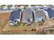 Aerial view of houses with backyard decks at 5732 Cypress Bluff Ln, Hoschton, GA 30548