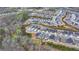 Aerial view of homes and community landscape at 5732 Cypress Bluff Ln, Hoschton, GA 30548