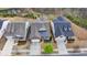 Aerial view of houses, driveways, and landscaping at 5732 Cypress Bluff Ln, Hoschton, GA 30548