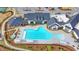 Aerial view of community pool, clubhouse, and tennis courts at 5732 Cypress Bluff Ln, Hoschton, GA 30548