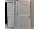 Two white doors with classic raised panel design at 5732 Cypress Bluff Ln, Hoschton, GA 30548