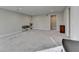 Neutral-toned basement featuring gray carpeting and built-in shelving at 5732 Cypress Bluff Ln, Hoschton, GA 30548