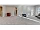 Finished basement with hardwood floors and a view into another room at 5732 Cypress Bluff Ln, Hoschton, GA 30548